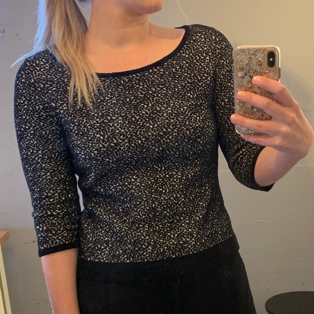 Black and white three quarter back zip sweater
